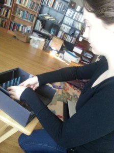 Set Designer Jenna Maren works on the Maquette (model of the set). 