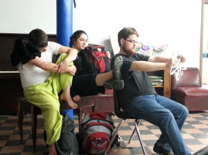 Chris, Emma, and Charlie improvising a scene.